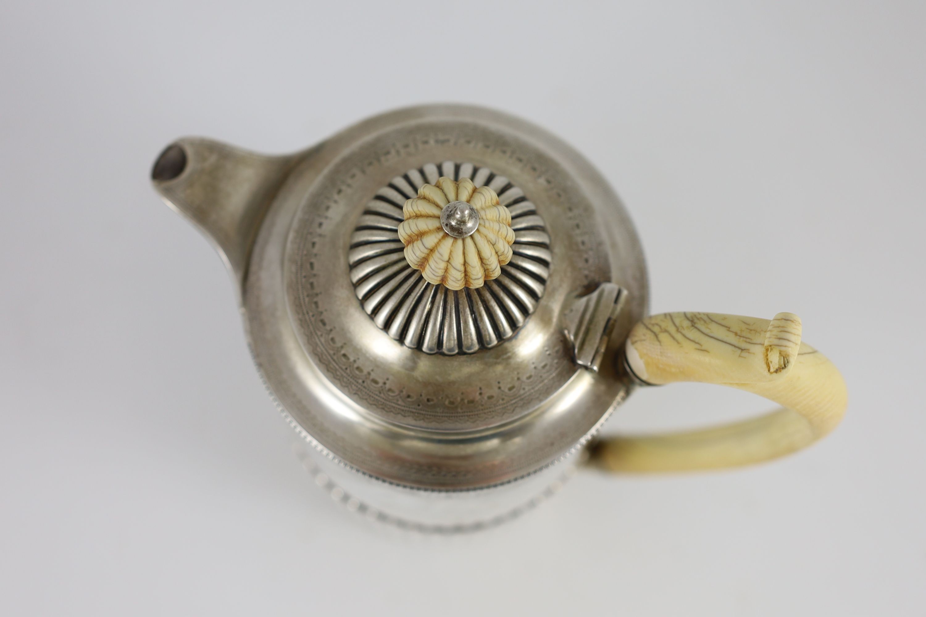 A Victorian demi-fluted silver hot water pot, by Frederick Brasted